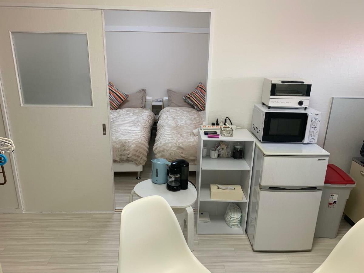 Goldhouse Shinosaka 303 Apartemen